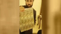 روحانی قلابی لبنانی که بین مردم دلار پخش می‌کرد