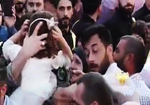 دیدار پدر رزمنده و دخترش پس از سه سال دوری